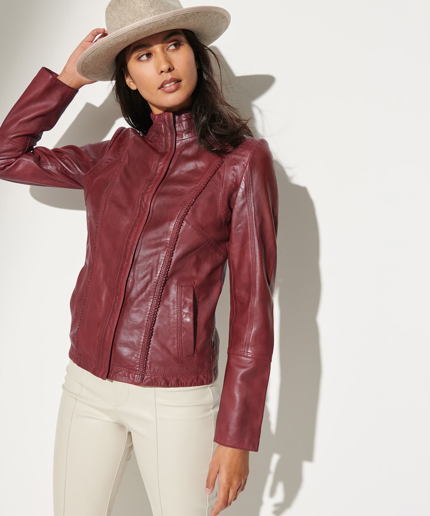 Man in slim-fit black leather jacket