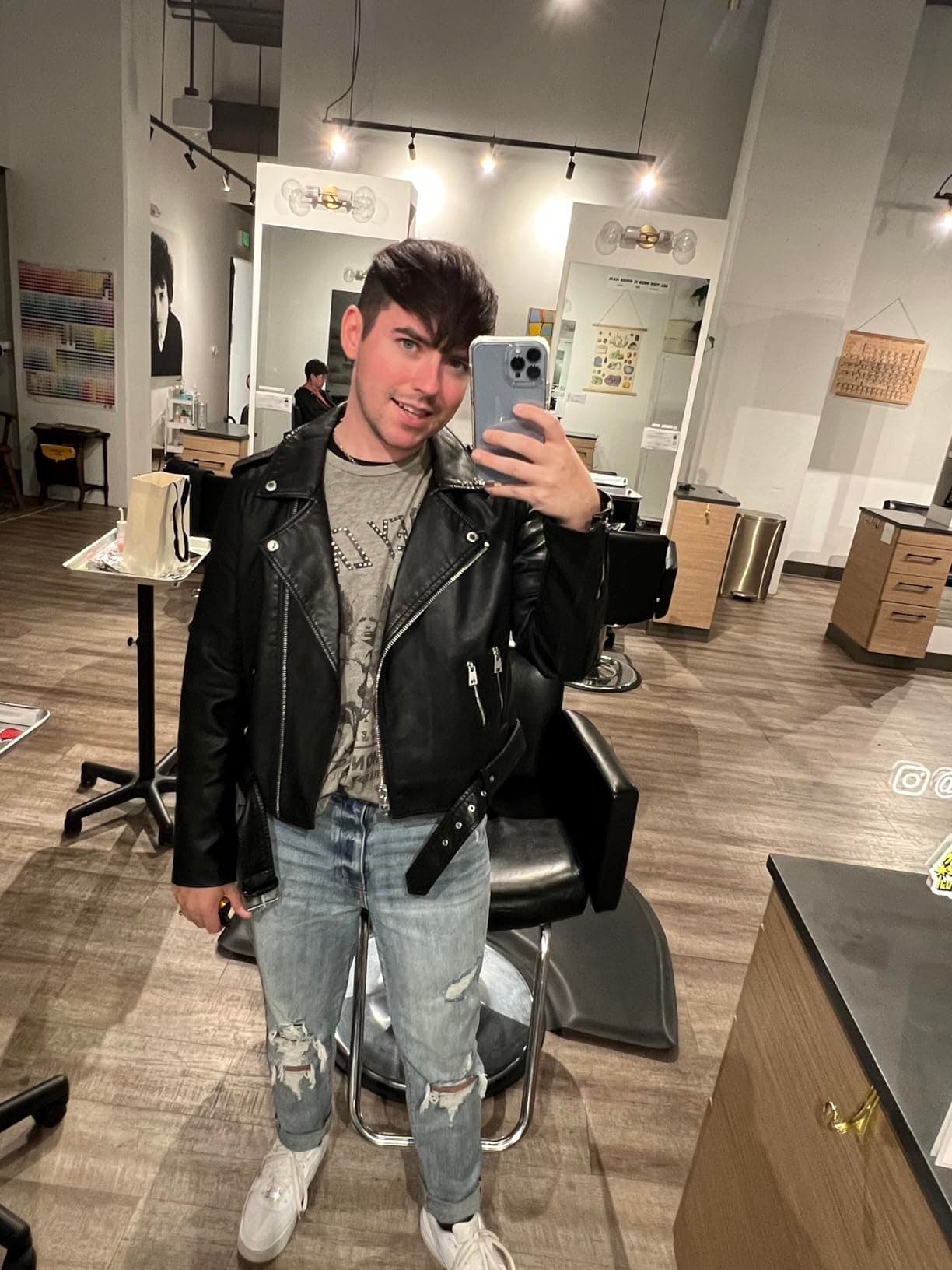 Model wearing oversized leather jacket